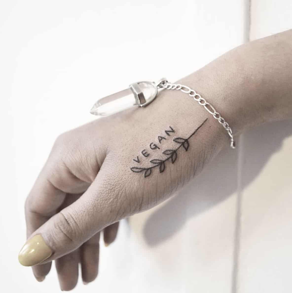 Delicate Vegan Symbol Hand Tattoo from Bianca