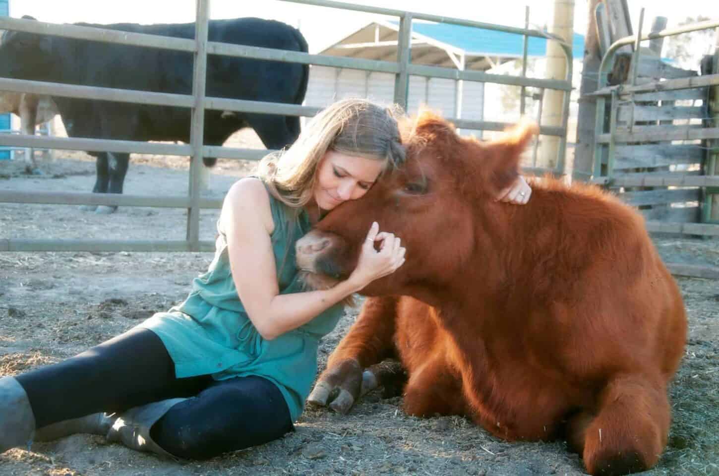 Michelle Cehn and Rescued Cow at Preetirang Farm Sanctuary