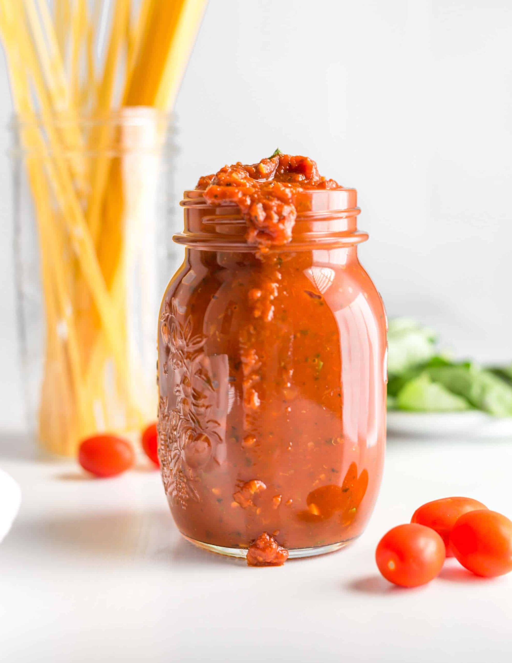 Jar of homemade vegan Italian marinara sauce. 