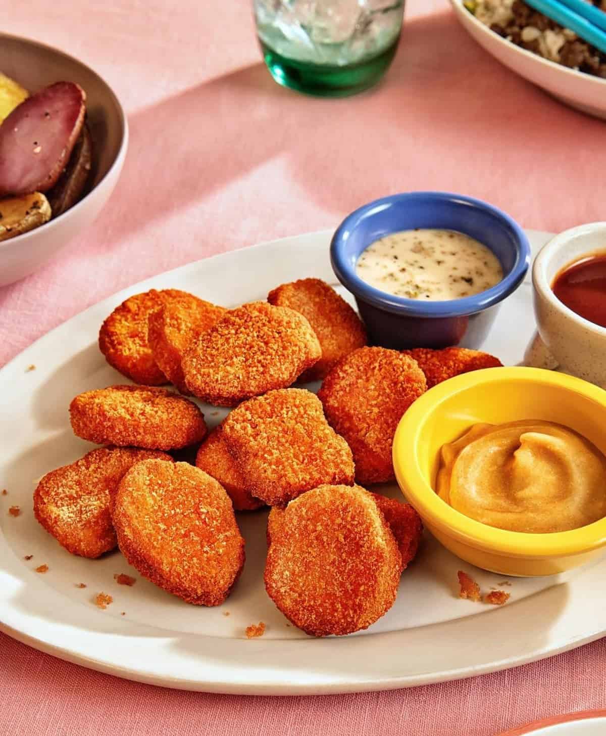 A plate of Impossible Foods brand plant-based chicken nuggets.