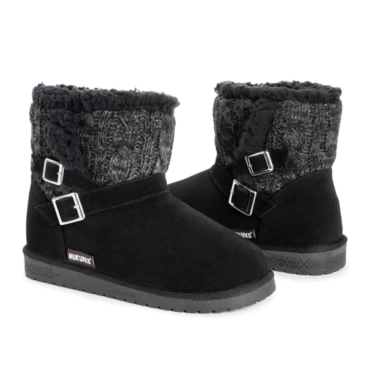 Black vegan Ugg boots from brand Muk Luks with buckles and faux suede and knit upper. 