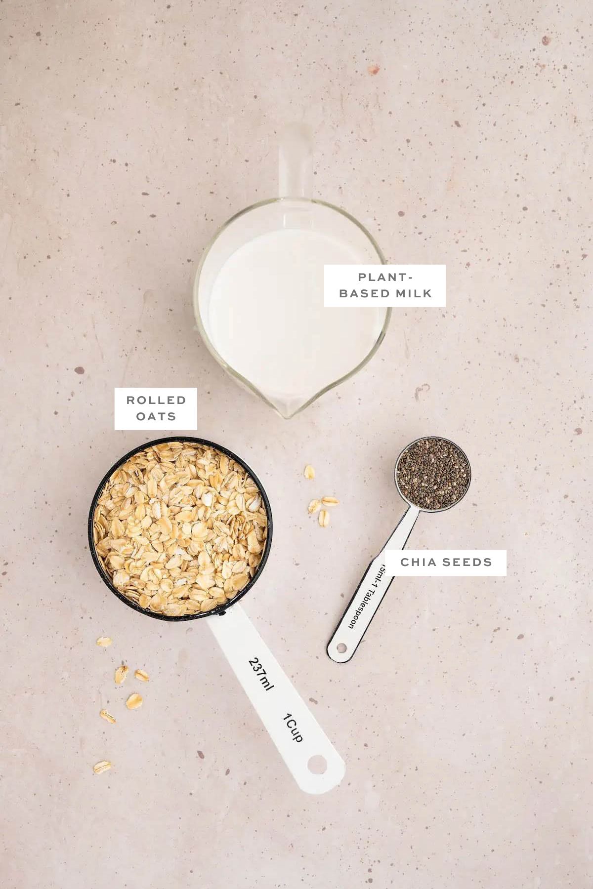 Key ingredients for overnight oats with labels.