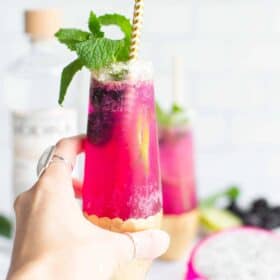 Pink sparkling drinks with mint leaves.