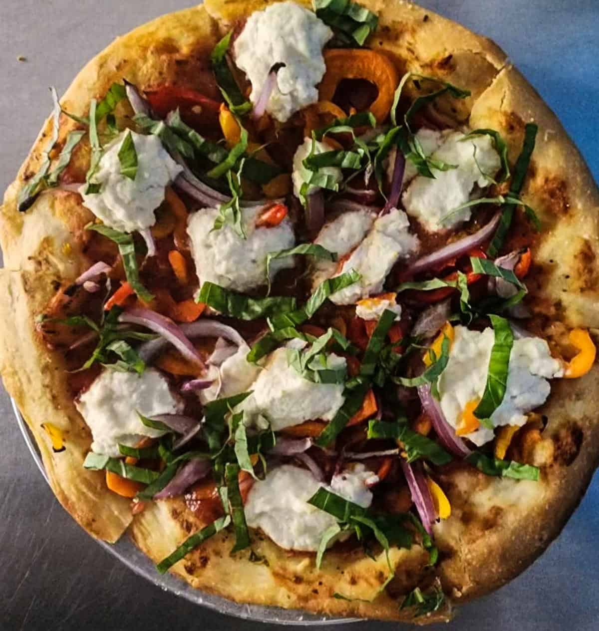 A vegan ricotta pizza from Secret Pizza Society in Portland.