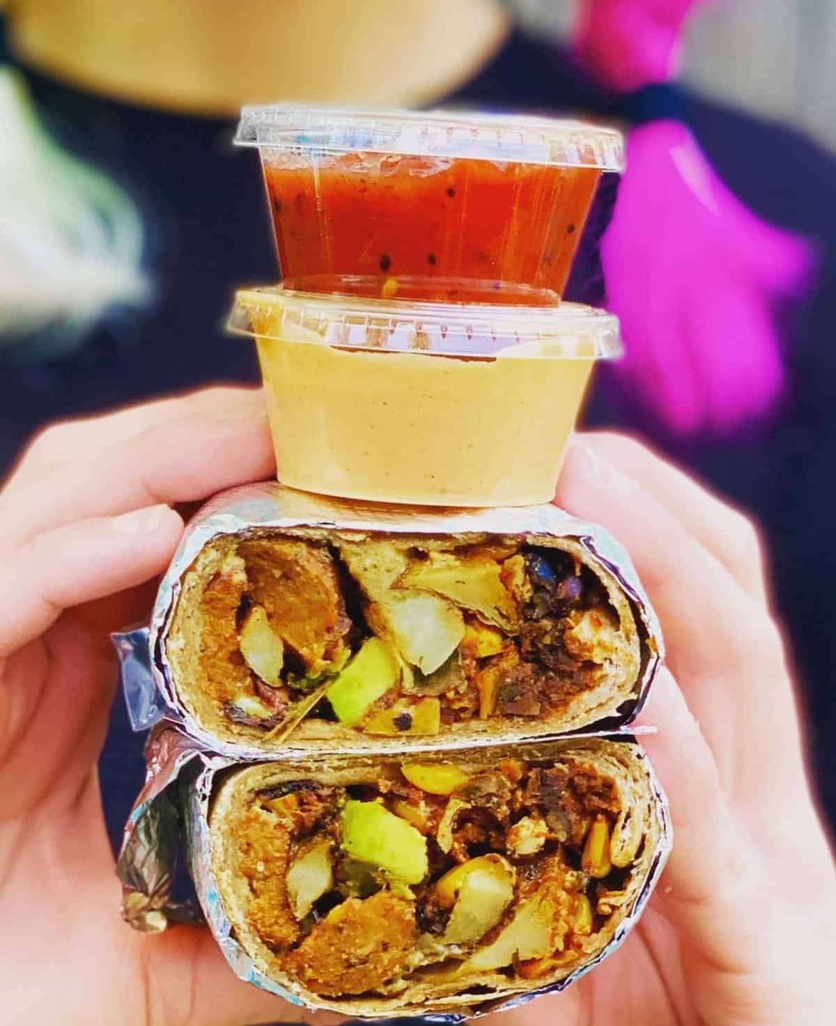 A vegan breakfast burrito with sauces from Counter Culture.