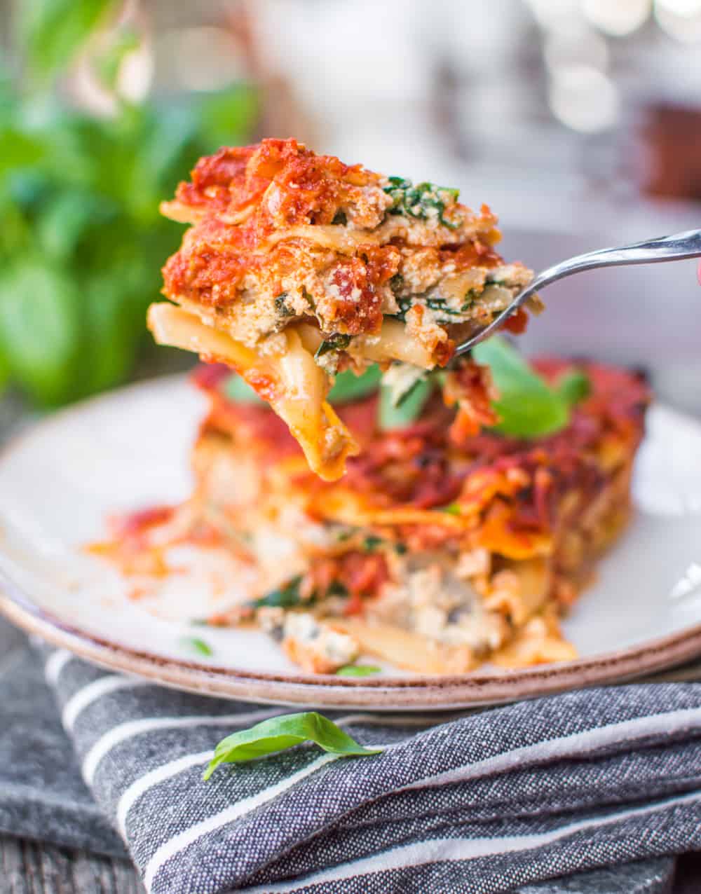 A forkful of vegan lasagna.