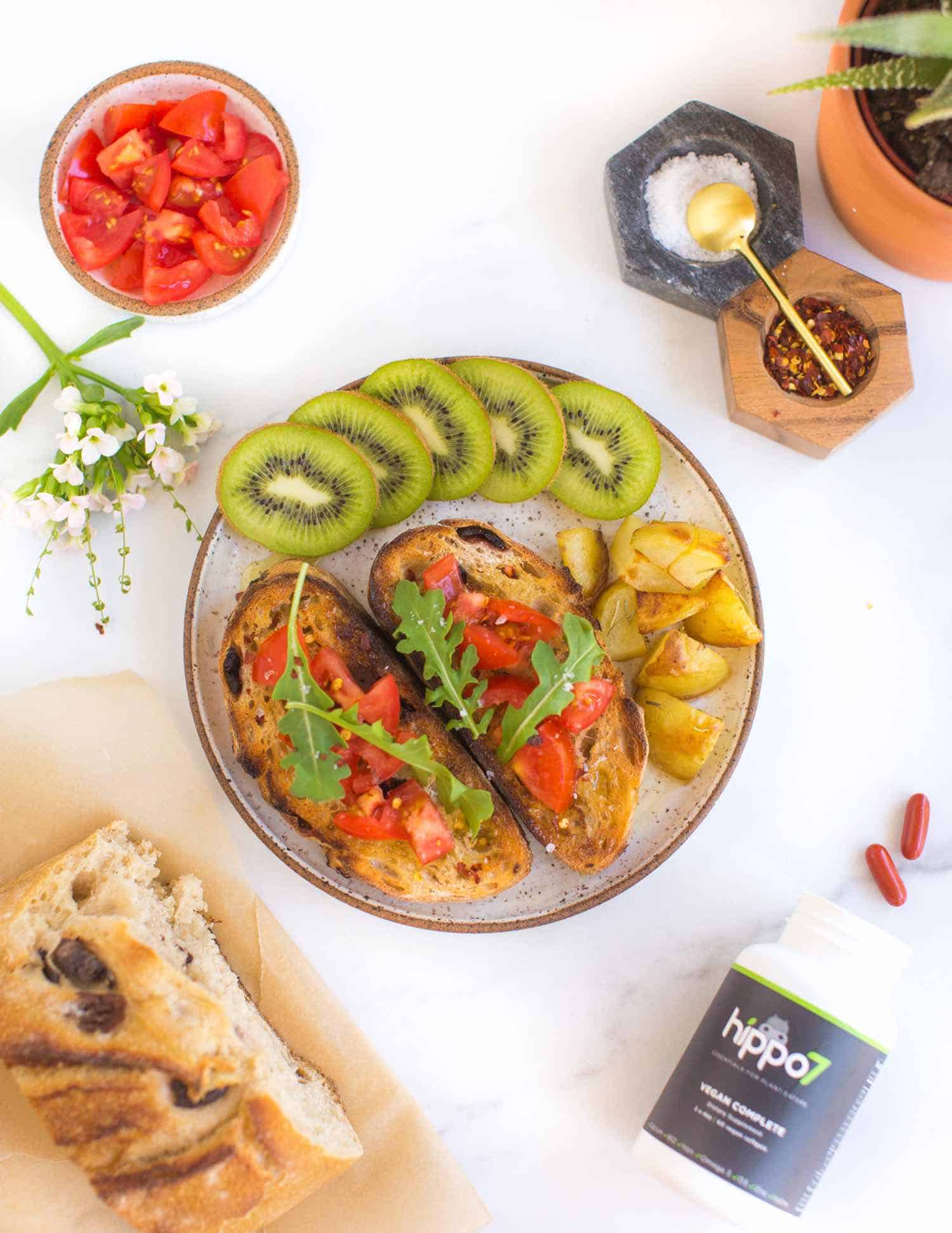 vegan vitamins with breakfast flatlay tomato toast with kiwi and hippo 7 vegetarian vitamins