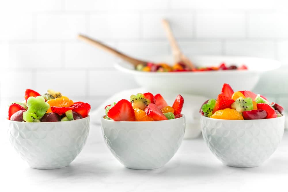 Vegan Fruit Salad Recipe in three small bowls.